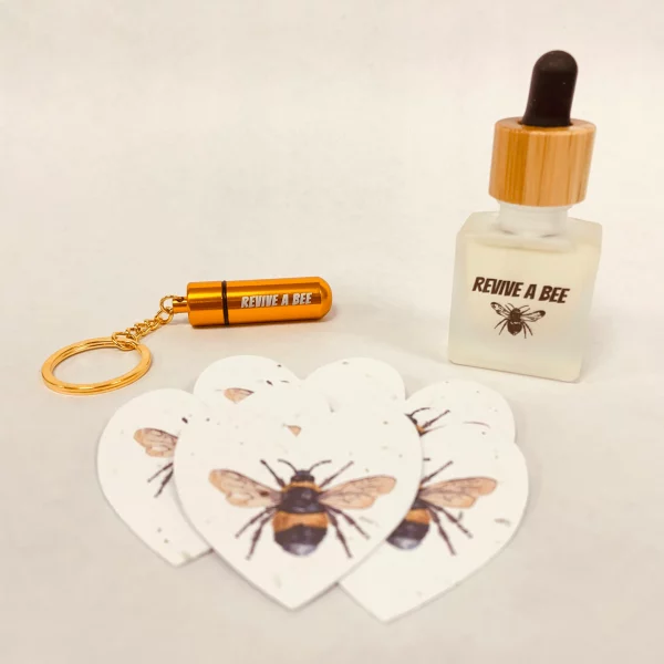 bee revival gift box with bee saver keyring, refill bottle and plantable hearts