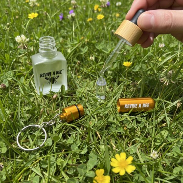 using your bee revival refill bottle to top up a bee rescue keyring